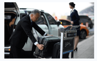 Chauffeur loading luggage